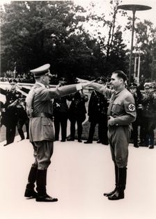 Nazi leaders Adolf Hitler and Rudolf Hess exchanging salutes, c1930s-c1940s. Creator: Unknown