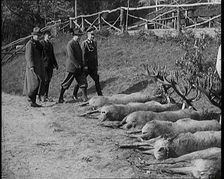 Nazi Officer Hermann Goering in Hunting Dress Showing His Colleagues a Line of Deer He Has..., 1931. Creator: British Pathe Ltd