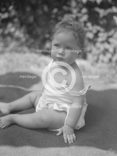 Nadelman baby, seated outdoors, 1923 July 12. Creator: Arnold Genthe.