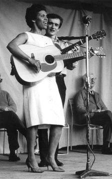 Nadia Cattouse and Martin Carthy, Parliament Hill Fields, London, early 1960s. Artist: Eddis Thomas
