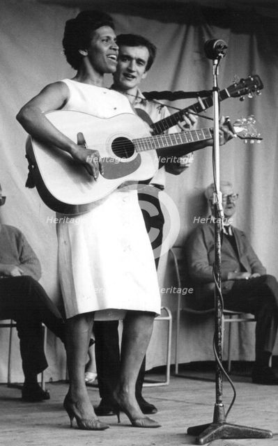 Nadia Cattouse and Martin Carthy, Parliament Hill Fields, London, early 1960s.  Artist: Eddis Thomas