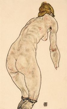 Naked woman standing back, 1917. Creator: Egon Schiele