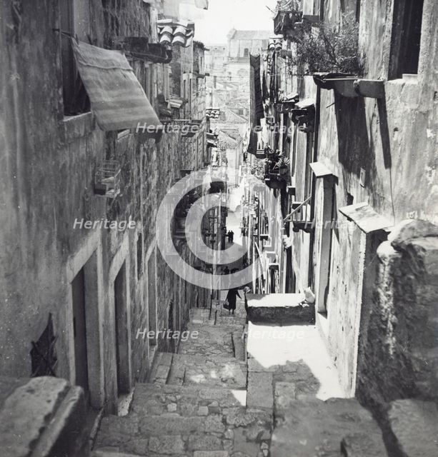 Narrow street in Dubrovnik, Croatia, Yugoslavia, 1939. Creator: Unknown.