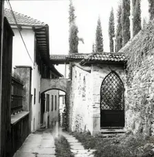 Narrow street, island of San Giulio, Lake Orta, Italy, c1955. Creator: Arthur Charles Kirby Ware