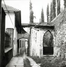 Narrow street, island of San Giulio, Lake Orta, Italy, c1955. Creator: Arthur Charles Kirby Ware