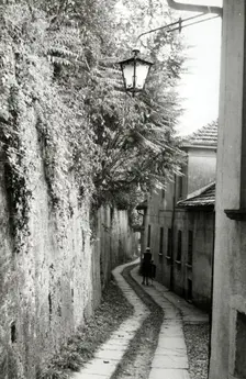 Narrow street, Orta San Giulio, Lake Orta, Italy, c1955. Creator: Arthur Charles Kirby Ware