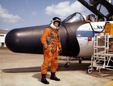NASA astronaut with experimental airplane, 1979. Creator: NASA