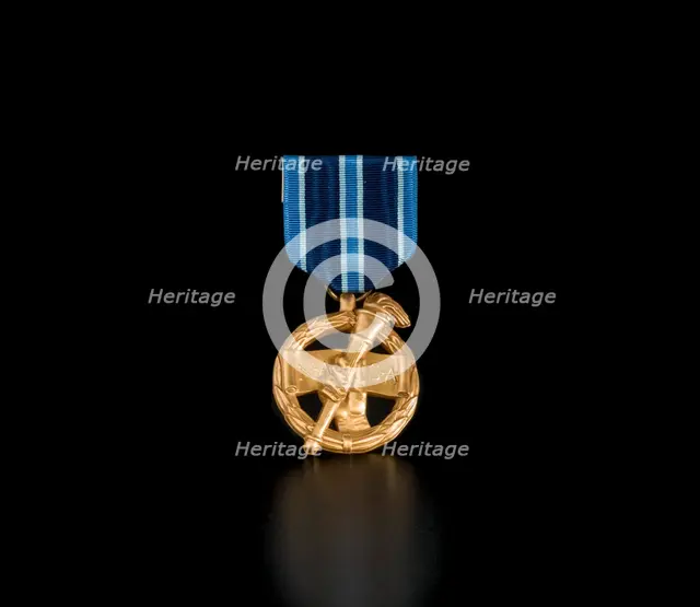 NASA Outstanding Leadership Medal awarded to Sally Ride, 1987. Creator: Unknown.