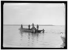 Net fishing, between 1909 and 1923. Creator: Harris & Ewing