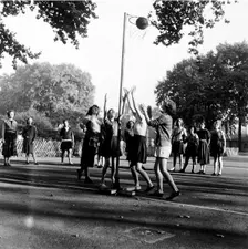 Netball game at Coram's Fields School, Camden, London, 1959. Creator: Henry Grant