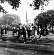 Netball game at Coram's Fields School, Camden, London, 1959. Creator: Henry Grant