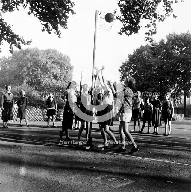 Netball game at Coram's Fields School, Camden, London, 1959. Creator: Henry Grant.