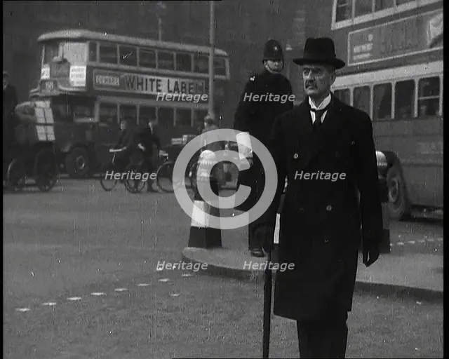 Neville Chamberlain, British Politician, Walking Across a London Street, 1937. Creator: British Pathe Ltd.