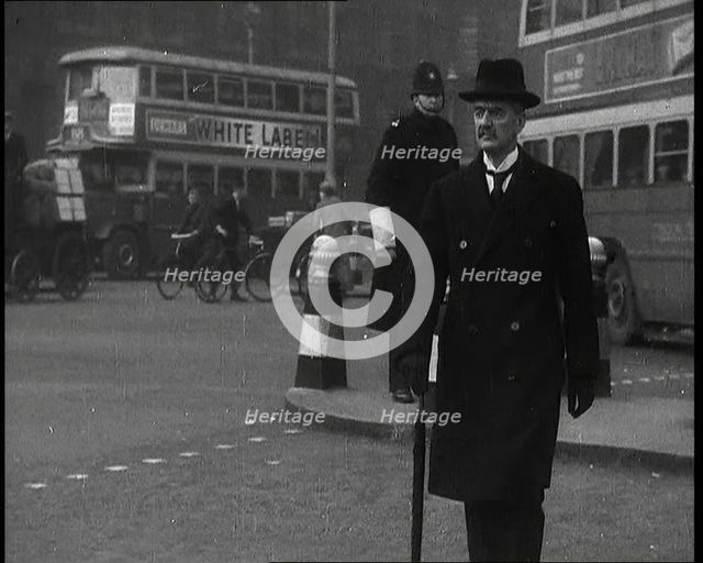Neville Chamberlain, British Politician, Walking Across a London Street, 1937. Creator: British Pathe Ltd.