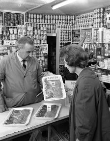 New metric system of selling bacon, Stocksbridge, Sheffield, South Yorkshire, 1966. Creator: Michael Walters