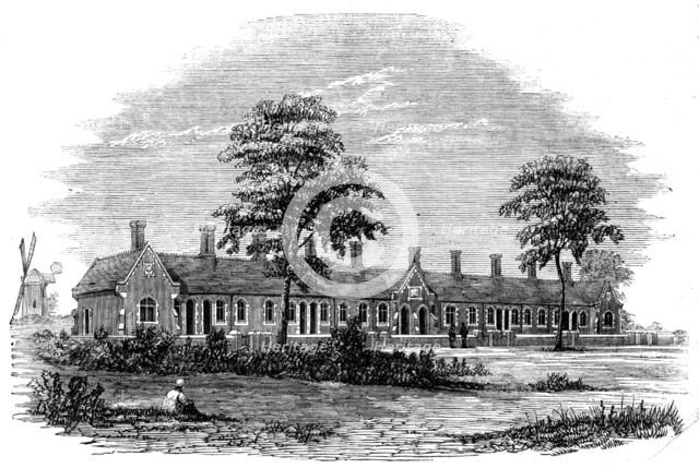 New Almshouses at Old Buckenham, near Attleborough, Norfolk, founded by Mr. Robert Cocks, 1861. Creator: Unknown.