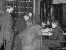 New citizens signing naturalization papers in judge's chambers, 1910. Creator: Bain News Service