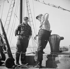 New England fishermen resting on the Fulton docks, New York, 1943. Creator: Gordon Parks