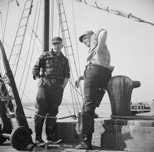 New England fishermen resting on the Fulton docks, New York, 1943. Creator: Gordon Parks