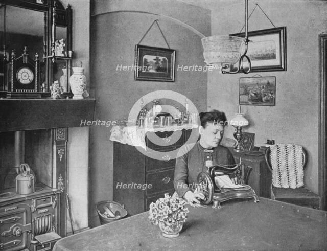 New room in a model dwelling, London, c1900 (1901). Artist: Unknown.