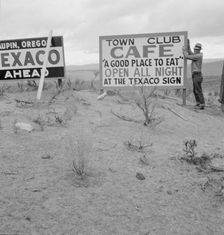 New sign along highway advertises a new enterprise in... Town of Maupin, Oregon, 1939. Creator: Dorothea Lange