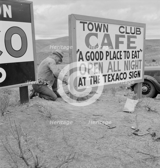 New sign along highway advertises a new enterprise in the lonely town of Maupin, Oregon, 1939. Creator: Dorothea Lange.