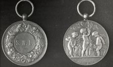 New York City - Medal of the School Nature League , 1921. Creator: Frances Benjamin Johnston