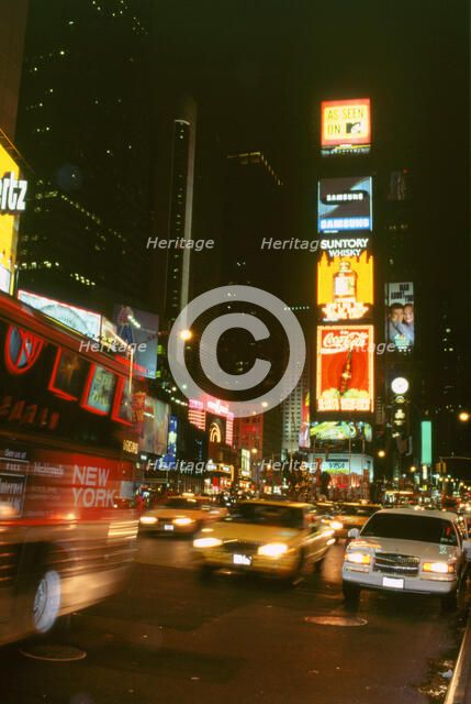 New York city street at night. Artist: Unknown.