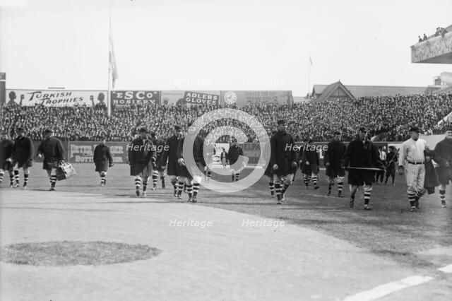 New York Giants walk onto the field at the Polo Grounds New York prior to Game One of the 1912.... Creator: Bain News Service.