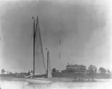 New York - Oyster Bay, Long Island Yacht Club: looking ashore past sail boat toward house, 1905. Creator: Unknown