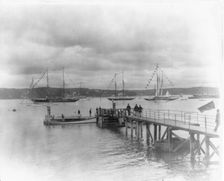 New York - Oyster Bay, Long Island Yacht Club: looking past pier to sailing yachts at anchor, 1905. Creator: Unknown