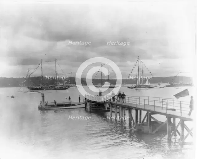 New York - Oyster Bay, Long Island Yacht Club: looking past pier to sailing yachts at anchor, 1905. Creator: Unknown.
