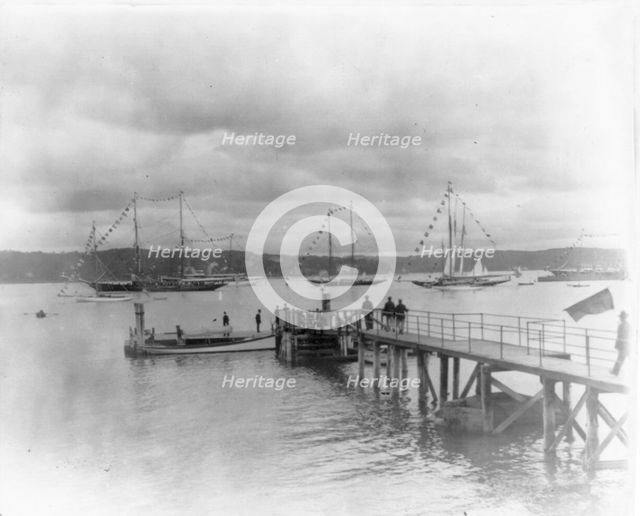 New York - Oyster Bay, Long Island Yacht Club: looking past pier to sailing yachts at anchor, 1905. Creator: Unknown.