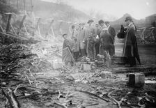 New York, NL & Philadelphia, NL players view fire damage, Polo Grounds, 1911. Creator: Bain News Service