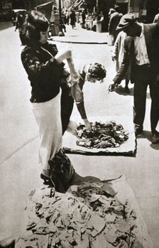 New York street trader selling stockings, USA, c1920s-c1930s. Creator: Unknown