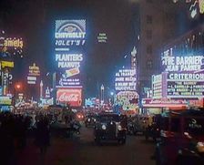 New York Times Square at Night Lit up By Lights, 1920s. Creator: British Pathe Ltd
