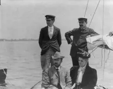 New York Yacht Club, Oyster Bay, L.I., 1905: 2 men with man and woman watching yacht race, 1905. Creator: Frances Benjamin Johnston