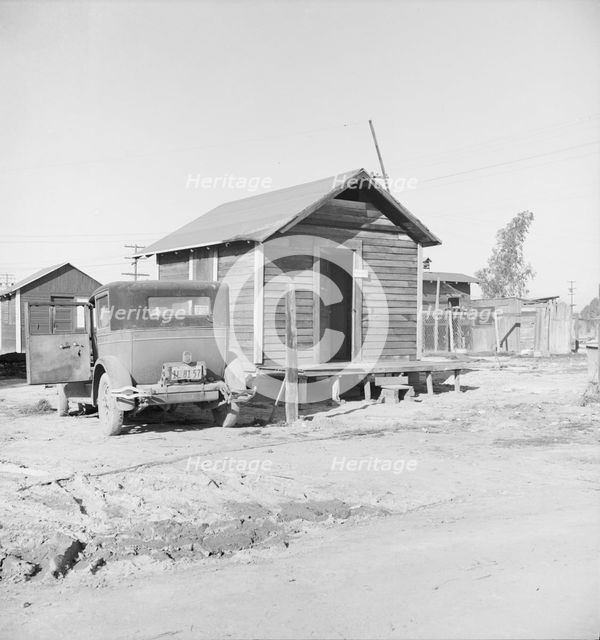 Newly-built cabins, rent five dollars per month, near Bakersfield, California , 1939. Creator: Dorothea Lange.