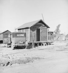 Newly-built cabins, rent five dollars per month, near Bakersfield, California , 1939. Creator: Dorothea Lange