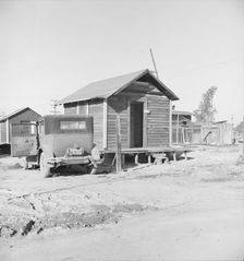 Newly-built cabins, rent five dollars per month, near Bakersfield, California , 1939. Creator: Dorothea Lange