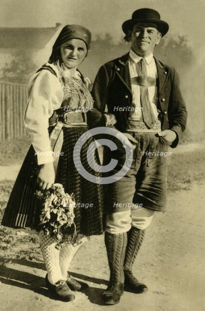 Newlyweds in traditional costume, Carinthia, Austria, c1935.  Creator: Unknown.