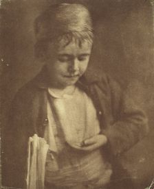Newsboy looking at coins in his hand, half-length portrait, c1900. Creator: Elizabeth B. Brownell