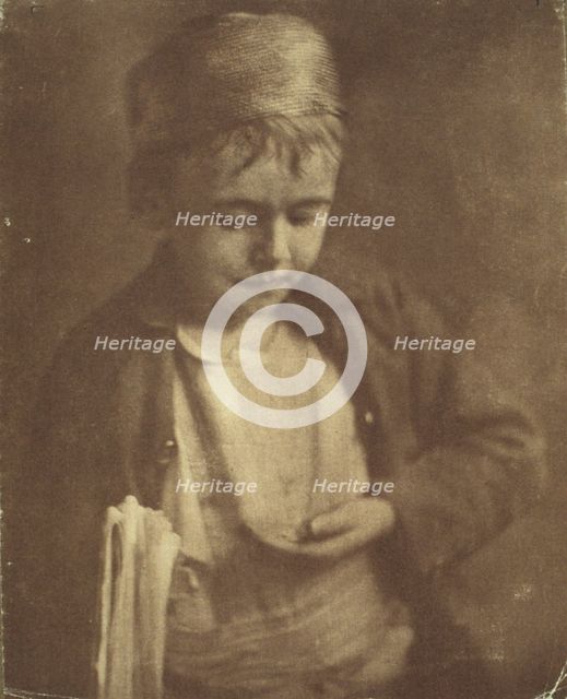 Newsboy looking at coins in his hand, half-length portrait, c1900. Creator: Elizabeth B. Brownell.