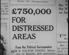 Newspaper Headline Reading: £750,000 for Distressed Areas 1933. Creator: British Pathe Ltd