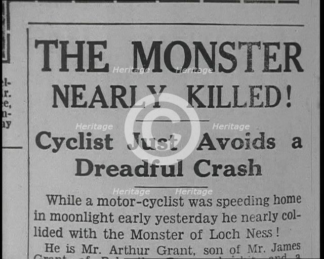 Newspaper with Headline Reading: 'The Monster Nearly Killed! - Cyclist Just Avoids a Dread..., 1933. Creator: British Pathe Ltd.