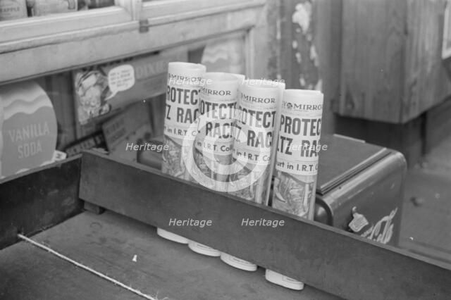 Newspapers for sale, 61st Street between 1st and 3rd Avenues, New York, 1938. Creator: Walker Evans.