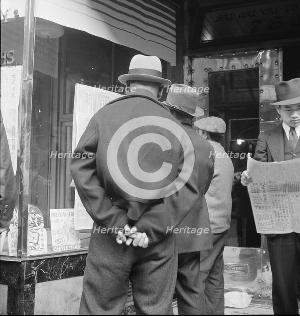 News of the surrender of Canton, San Francisco, California, 1938. Creator: Dorothea Lange.