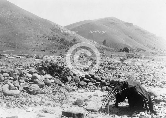 Nez Percé sweat-lodge, c1910. Creator: Edward Sheriff Curtis.