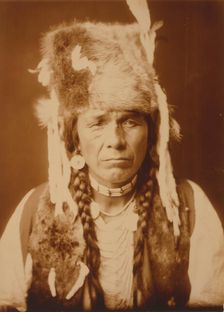 Nez Percé with furcap, c1904. Creator: Edward Sheriff Curtis