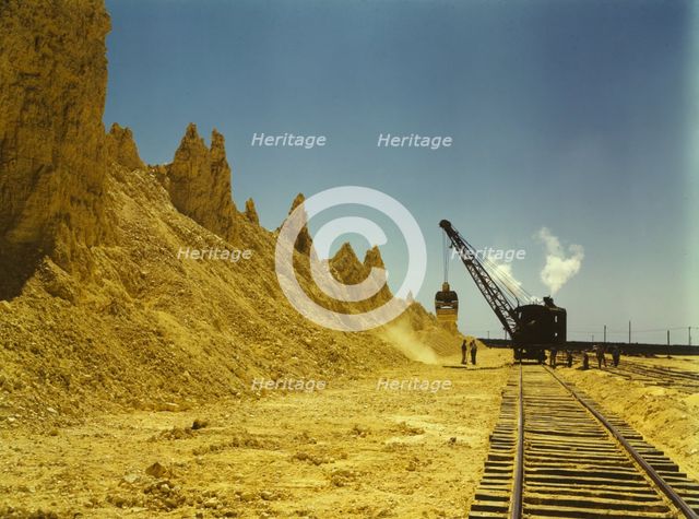 Nearly exhausted sulphur vat from which railroad..., Freeport Sulphur Co, Hoskins Mound, Texas, 1943 Creator: John Vachon.